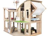 Plan toys Doll Houses Amazon Com Plan toys the Green Dollhouse with Furniture
